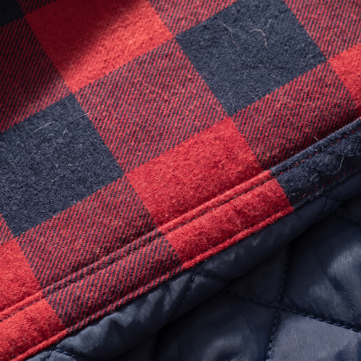 Close-up of the brushed cotton flannel and quilted lining, red and navy